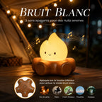 Veilleuse Braise lumineuse sur socle effet bois avec 5 sons apaisants : feu de camp, piano, chant d’oiseaux, mouettes et ruisseau.