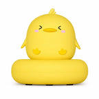 Veilleuse LED poussin Piou jaune pour enfant sur fond blanc