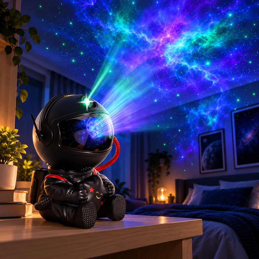 Projecteur Orion noir posé sur un bureau, projetant une galaxie au plafond d'une chambre